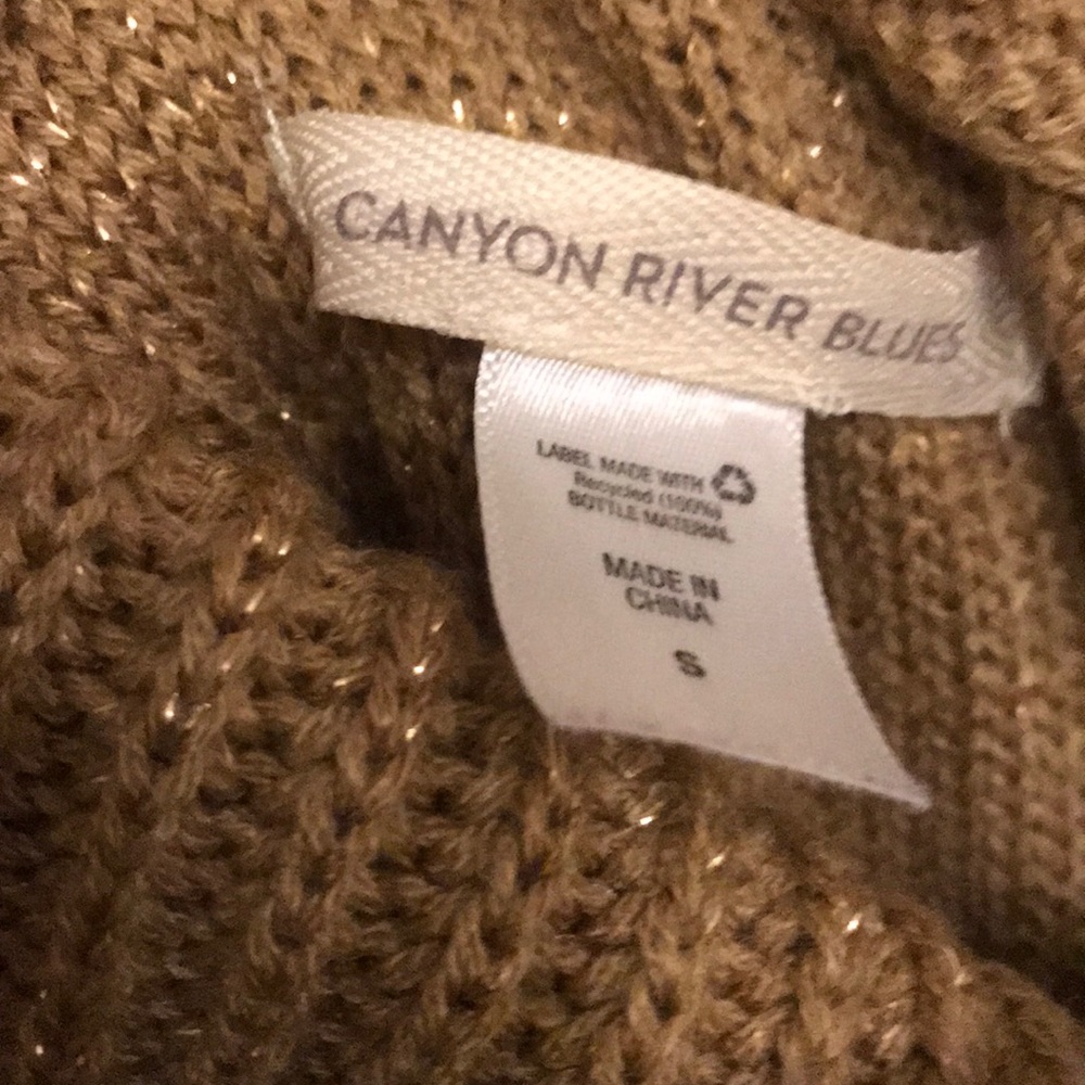 Gold Turtleneck Sweater.